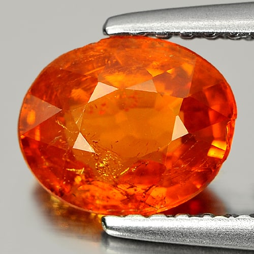 Natural Orange Spessartine Garnet 1.84 Ct. Oval Shape 7.8 x 6.3 Mm. Gemstone From Nigeria: Product ID: 802916064 Product Name: Natural Spessartine Weight: 1.84 CT. Size: 7.8 x 6.3 x 4 MM. Shape: Oval Color: Orange Clarity:VSI Luster: Good Gems Origin: Nigeria Treatment: Unheated Crystal Str