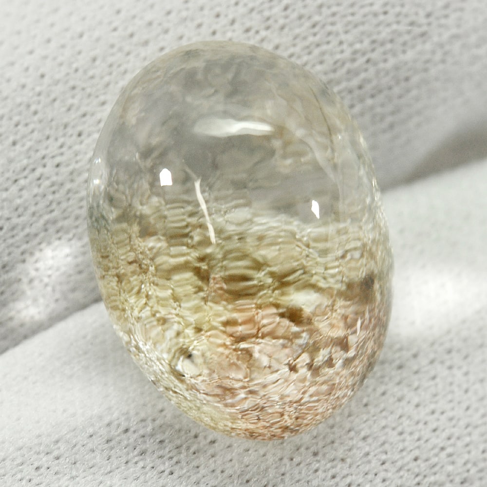 Natural Moss Quartz 16.54 Ct. Oval Cabochon Shape 18.2 x 13 Mm. Gemstone From Thailand: Product ID: 805529531 Product Name: Natural Quartz Weight: 16.54 CT. Size: 18.2 x 13 x 10.2 MM. Shape: Oval Cabochon Color: White Clarity:Semi - Transparent Luster: Good Gems Origin: Thailand Treatmen