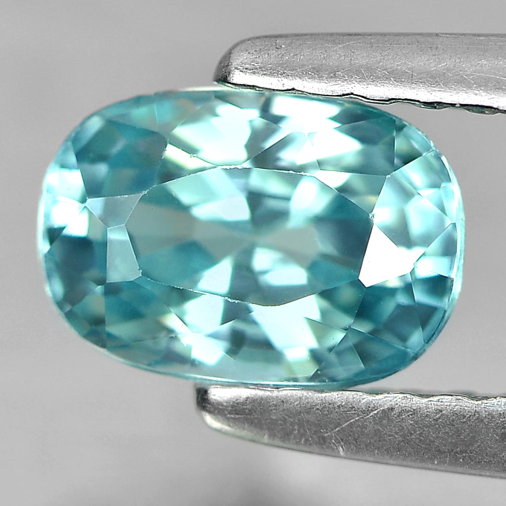Natural Blue Zircon 1.28 Ct. Oval Shape 6.9 x 4.9 Mm. Gemstone From Cambodia: Product ID: 807717069 Product Name: Natural Zircon Weight: 1.28 CT. Size: 6.9 x 4.9 x 3.6 MM. Shape: Oval Color: Blue Clarity:VSI Luster: Good Gems Origin: Cambodia Treatment: Heated Crystal Structure