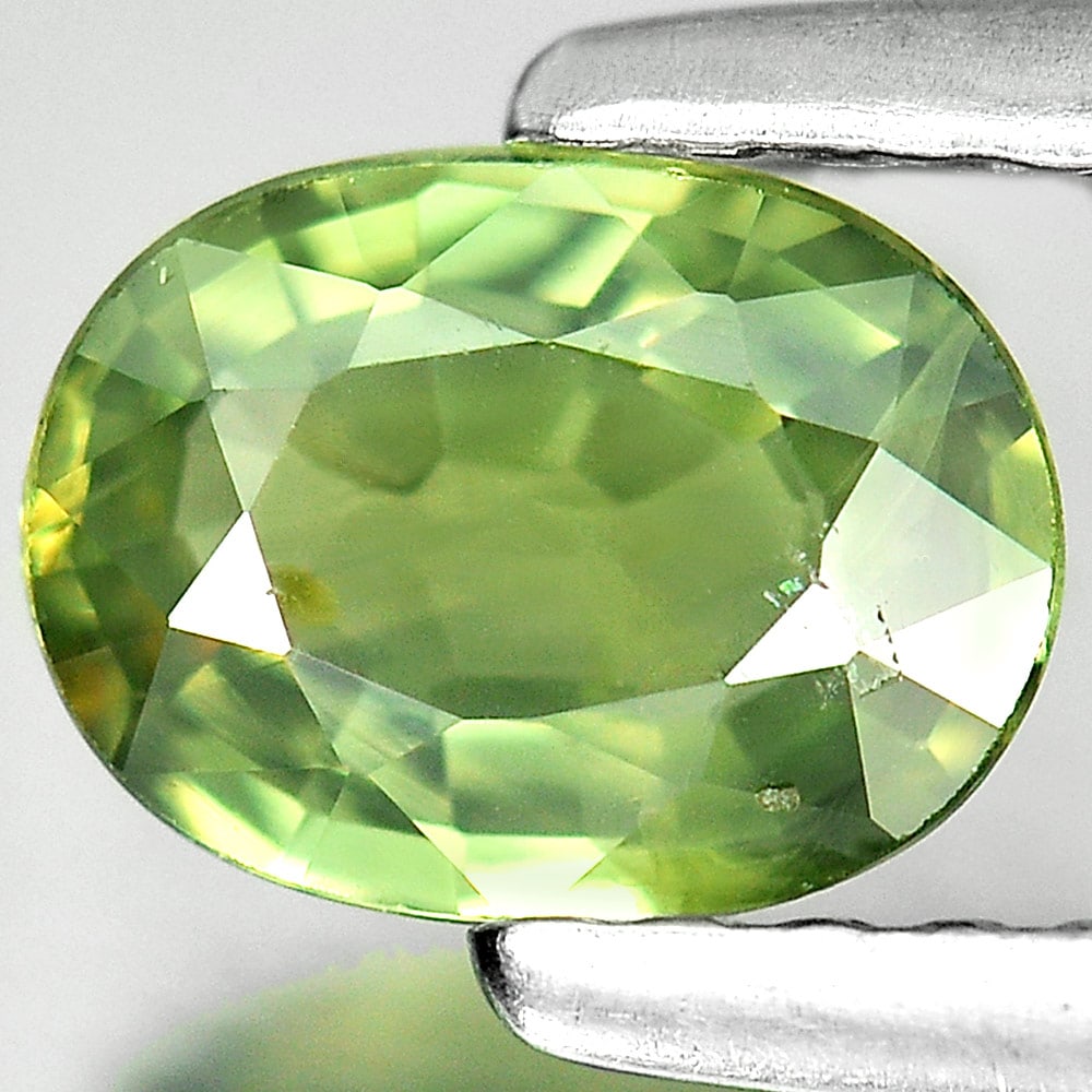 Natural Green Sapphire 0.79 Ct. Oval Shape 6.6 x 5 Mm. Gemstone From Thailand: Product ID: 806129993 Product Name: Natural Green Sapphire Weight: 0.79 CT. Size: 6.6 x 5 x 2.6 MM. Shape: Oval Color: Green Clarity:SI1 Luster: Good Gems Origin: Thailand Treatment: Heated Crystal St