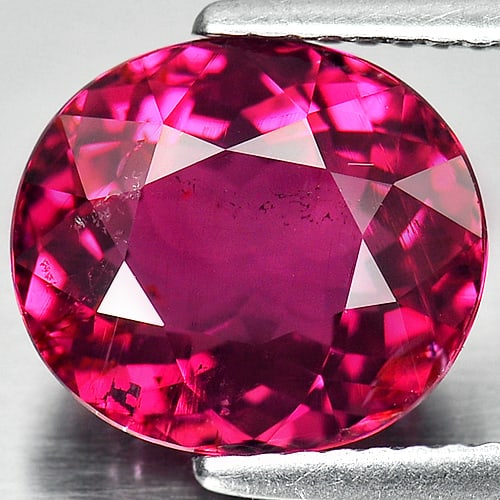 Natural Vivid Purplish Pink Tourmaline 4.18 Ct. Oval Shape 10.8 x 9.5 Mm. Gemstone From Nigeria: Product ID: 807224233 Product Name: Natural Tourmaline Weight: 4.18 CT. Size: 10.8 x 9.5 x 5.9 MM. Shape: Oval Color: Purplish Pink Clarity:SI Luster: Very Good Gems Origin: Nigeria Treatment: Unheate