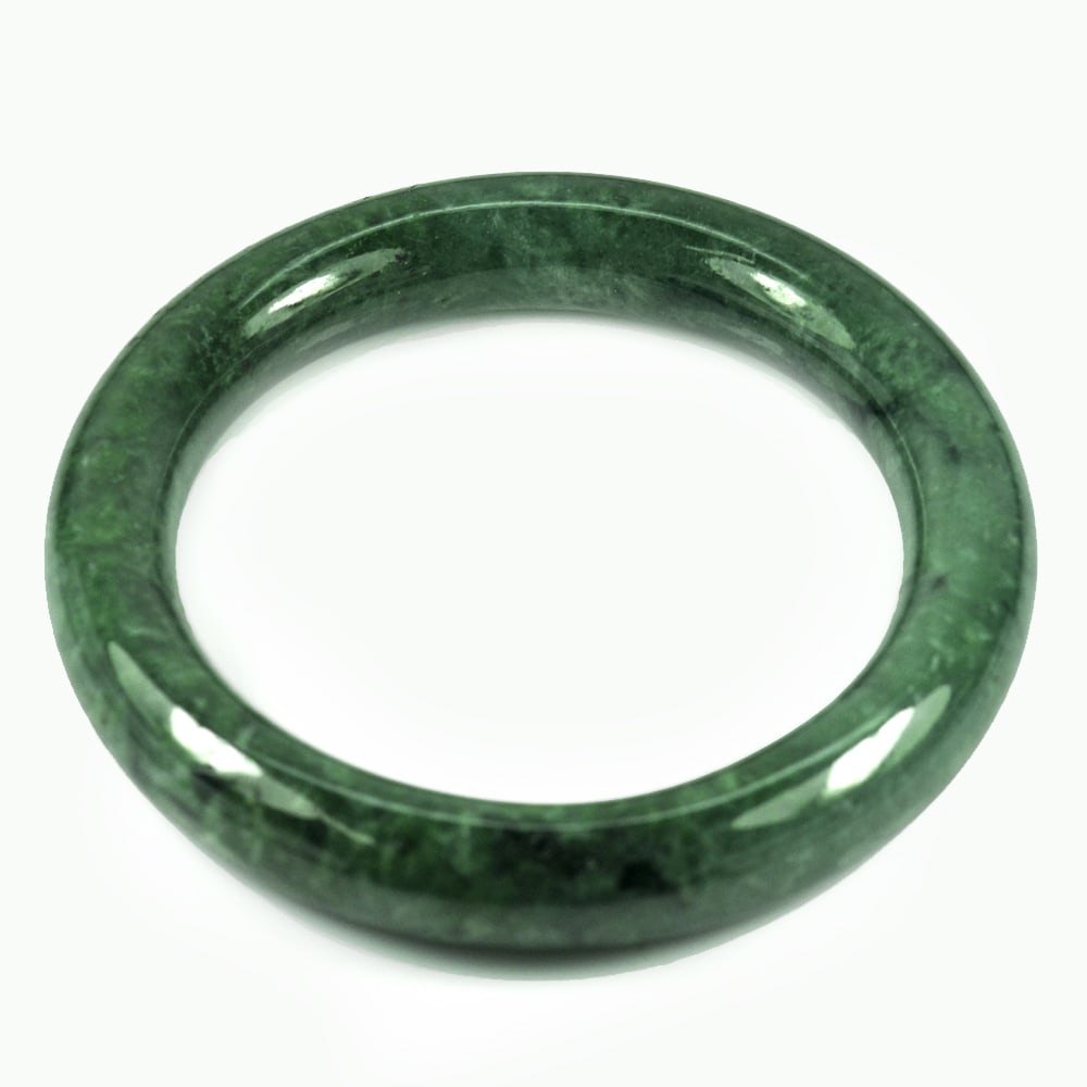 Natural Green Jade Bangle Diameter 60 Mm. Round Cabochon 382.19 Ct. Gemstone: Product ID: 819814190 Product Name: Natural Jade Weight: 382.19 CT. Size: 80 x 60 x 12 MM. Shape: Round Cabochon Color: Green Clarity:Opaque Luster: Good Gems Origin: Thailand Treatment: Unheated Crys