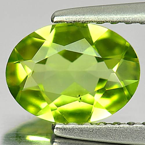 Natural Green Peridot 0.96 Ct. Oval Shape 7.9 x 6 Mm. Gemstone From Pakistan: Product ID: 805314310 Product Name: Natural Peridot Weight: 0.96 CT. Size: 7.9 x 6 x 3 MM. Shape: Oval Color: Green Clarity:SI1 Luster: Good Gems Origin: Pakistan Treatment: Unheated Crystal Structure
