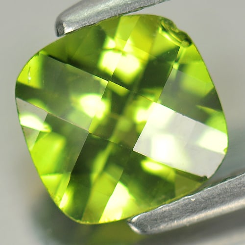 Natural Green Peridot 1.39 Ct. Cushion Checkerboard Cut 7 x 6.9 Mm. Gemstone From Pakistan: Product ID: 805305215 Product Name: Natural Peridot Weight: 1.39 CT. Size: 7 x 6.9 x 4.2 MM. Shape: Cushion Checkerboard Color: Green Clarity:SI1 Luster: Good Gems Origin: Pakistan Treatment: Unheated