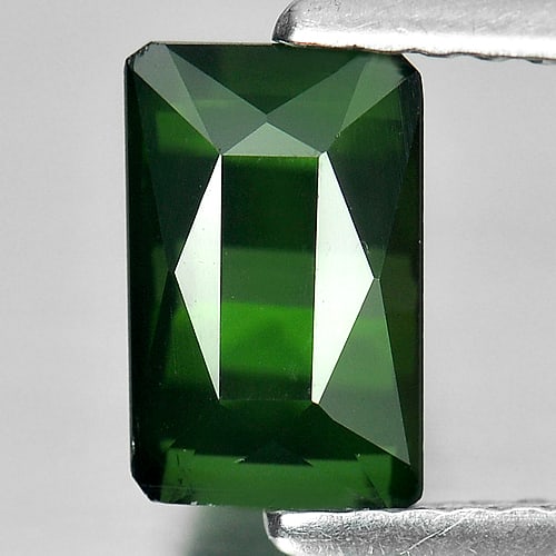 Natural Green Tourmaline 1.34 Ct. Clean Octagon Shape 7.6 x 4.8 Mm. Gemstone From Nigeria: Product ID: 807237778 Product Name: Natural Tourmaline Weight: 1.34 CT. Size: 7.6 x 4.8 x 4.6 MM. Shape: Octagon Color: Green Clarity:IF Luster: Good Gems Origin: Nigeria Treatment: Unheated Crystal S