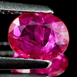 Natural Unheated Purplish Pink Ruby 0.56 Ct. Oval Shape 6.1 x 4.8 Mm. Gemstone From Tanzania (1 of 3)