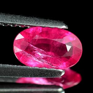 Natural Unheated Purplish Pink Ruby 0.65 Ct. Oval Shape 7.2 x 4.4 Mm. Gemstone From Tanzania (1 of 3)