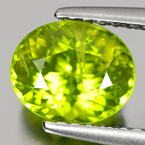 Natural Green Peridot 1.78 Ct. Oval Shape 7.7 x 6.4 Mm. Gemstone From China: Product ID: 805310046 Product Name: Natural Peridot Weight: 1.78 CT. Size: 7.7 x 6.4 x 5.3 MM. Shape: Oval Color: Green Clarity:SI Luster: Good Gems Origin: China Treatment: Unheated Crystal Structure
