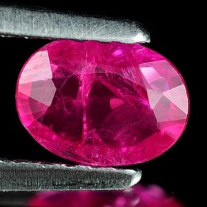 Natural Purplish Pink Ruby 0.57 Ct. Oval Shape 6.3 x 4.6 Mm. Gemstone From Tanzania (1 of 3)