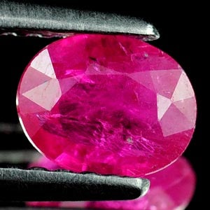 Natural Unheated Purplish Pink Ruby 0.63 Ct. Oval Shape 6.2 x 4.9 Mm. Gemstone From Tanzania (1 of 3)