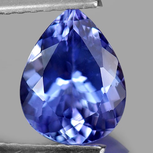 Natural Violetish Blue Tanzanite 1.60 Ct. Pear Shape 8.8 x 6.8 Mm. Gemstone From Tanzania: Product ID: 807009301 Product Name: Natural Tanzanite Weight: 1.60 CT. Size: 8.8 x 6.8 x 4.4 MM. Shape: Pear Color: Violetish Blue Clarity:IF Luster: Very Good Gems Origin: Tanzania Treatment: Heated 