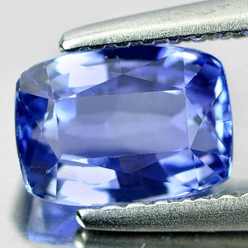 Natural Violetish Blue Tanzanite 1.42 Ct. Clean Cushion Shape 7.2 x 5.3 Mm. Gemstone From Tanzania: Product ID: 807006034 Product Name: Natural Tanzanite Weight: 1.42 CT. Size: 7.2 x 5.3 x 4.1 MM. Shape: Cushion Color: Blue Clarity:IF Luster: Very Good Gems Origin: Tanzania Treatment: Heated Crystal