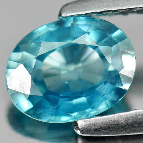 Natural Blue Zircon 1.21 Ct. Clean Oval Shape 7.1 x 5.5 Mm. Gemstone From Cambodia: Product ID: 807711070 Product Name: Natural Zircon Weight: 1.21 CT. Size: 7.1 x 5.5 x 3.1 MM. Shape: Oval Color: Blue Clarity:IF Luster: Good Gems Origin: Cambodia Treatment: Heated Crystal Structure: