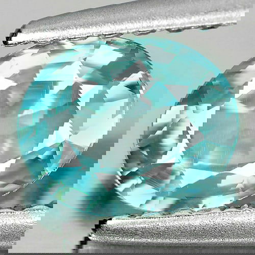 Natural Blue Zircon 0.88 Ct. Clean Oval Shape 6.2 x 5.2 Mm. Gemstone From Cambodia: Product ID: 807711795 Product Name: Natural Zircon Weight: 0.88 CT. Size: 6.2 x 5.2 x 2.8 MM. Shape: Oval Color: Blue Clarity:IF Luster: Good Gems Origin: Cambodia Treatment: Heated Crystal Structure: