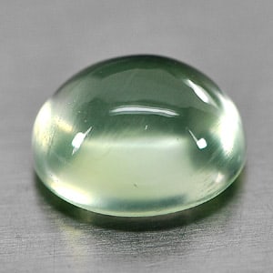 Natural Green Prehnite 2.11 Ct. Oval Cabochon Shape 8.5 x 7.2 Mm. Gemstone From Australia: Product ID: 818802302 Product Name: Natural Prehnite Weight: 2.11 CT. Size: 8.5 x 7.2 x 4.7 MM. Shape: Oval Cabochon Color: Green Clarity:Semi - Transparent Luster: Good Gems Origin: Australia Treatme