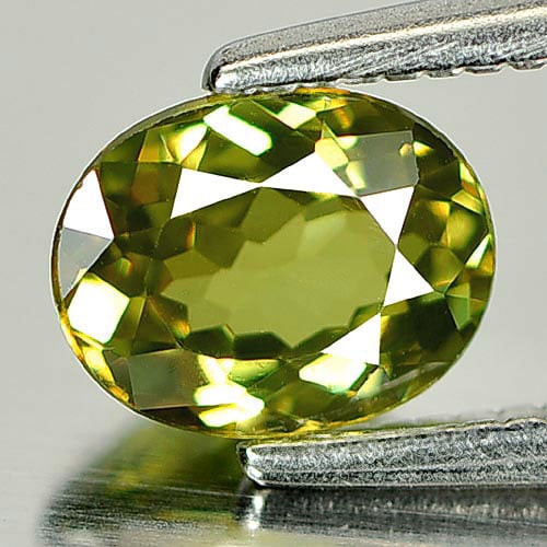 Natural Unheated Yellowish Green Demantoid Garnet 0.83 Ct. Oval Shape 6.4 x 5.1 Mm. Gemstone From: Product ID: 802931754 Product Name: Natural Demantoid Weight: 0.83 CT. Size: 6.4 x 5.1 x 2.8 MM. Shape: Oval Color: Yellowish Green Clarity:VS Luster: Very Good Gems Origin: Madagascar Treatment: Unhe