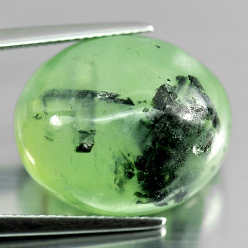 Natural Green Prehnite 31.01 Ct. Oval Cabochon Shape 19.7 x 16.4 Mm. Gemstone From Australia: Product ID: 818801346 Product Name: Natural Prehnite Weight: 31.01 CT. Size: 19.7 x 16.4 x 12.1 MM. Shape: Oval Cabochon Color: Green Black Clarity:Semi - Transparent Luster: Good Gems Origin: Austral