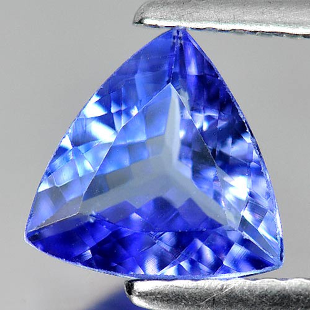 Natural Violetish Blue Tanzanite 1.19 Ct. Clean Trilliant Shape 7.7 x 7.5 Mm. Gemstone From Tanzania: Product ID: 807009421 Product Name: Natural Tanzanite Weight: 1.19 CT. Size: 7.7 x 7.5 x 3.5 MM. Shape: Trilliant Color: Blue Clarity:VVS Luster: Very Good Gems Origin: Tanzania Treatment: Heated Crys