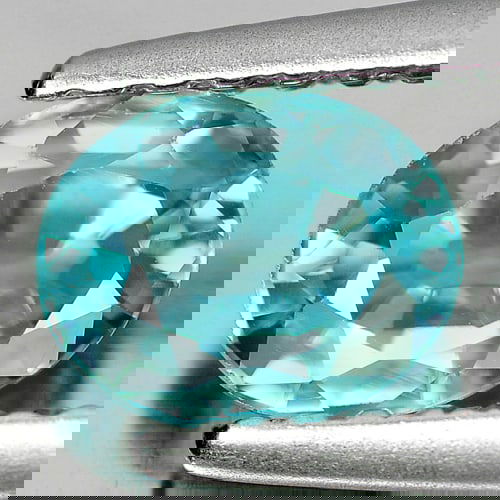 Natural Blue Zircon 0.90 Ct. Clean Oval Shape 6.1 x 4.9 Mm. Natural Gemstone From Cambodia: Product ID: 807711794 Product Name: Natural Zircon Weight: 0.90 CT. Size: 6.1 x 4.9 x 2.8 MM. Shape: Oval Color: Blue Clarity:IF Luster: Good Gems Origin: Cambodia Treatment: Heated Crystal Structure: