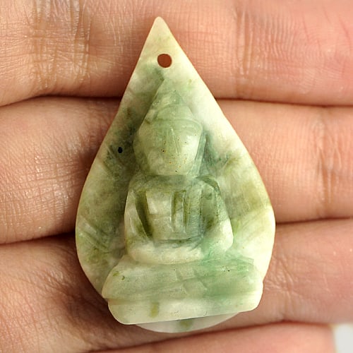 Natural White Green Jade 28.59 Ct. Buddha Carving Size 36 x 22 Mm. Gemstone From Thailand: Product ID: 819812000 Product Name: Natural Jade Weight: 28.59 CT. Size: 36 x 22 x 7.8 MM. Shape: Buddha Carving Color: Green Clarity:Opaque Luster: Good Gems Origin: Thailand Treatment: Unheated Crys