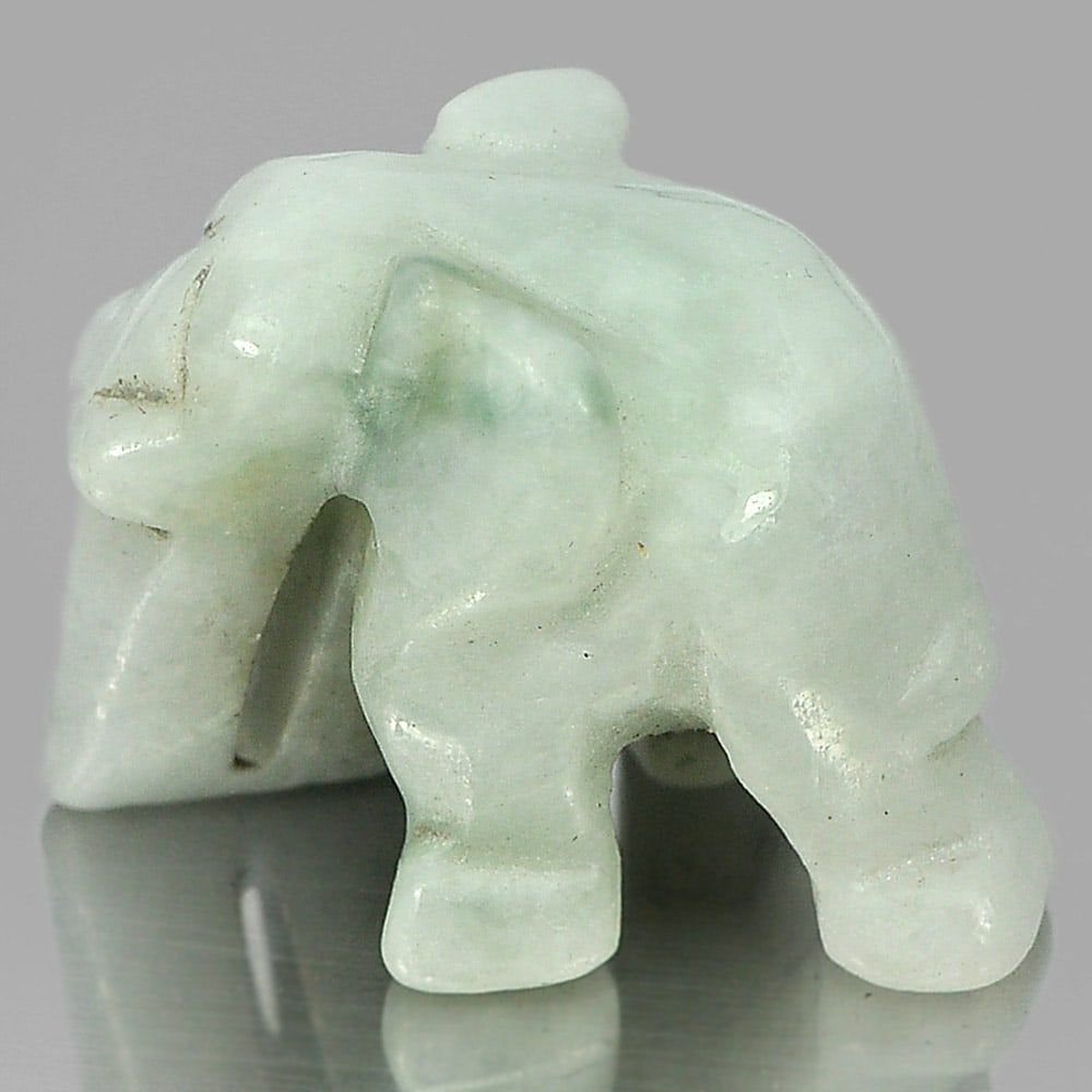 Natural Green White Jade 51.49 Ct. Elephant Carving 25 x 18 Mm. Gemstone From Thailalnd: Product ID: 819813009 Product Name: Natural Jade Weight: 51.49 CT. Size: 25 x 18 x 16 MM. Shape: Elephant Carving Color: Green Clarity:Opaque Luster: Good Gems Origin: Thailand Treatment: Unheated Cry