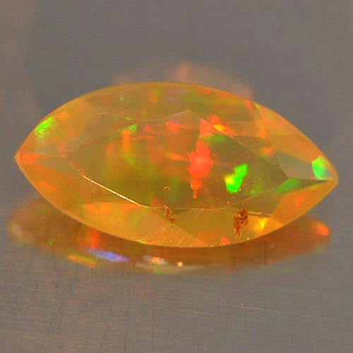 Natural Multi Color Opal 0.50 Ct. Marquise Shape 9.6 x 4.9 Mm. Unheated Gemstone: Product ID: 818726219 Product Name: Natural Opal Weight: 0.50 CT. Size: 9.6 x 4.9 x 3.2 MM. Shape: Marquise Color: Multi Color Clarity:Semi - Transparent Luster: Iridescent Gems Origin: Ethiopia Treat