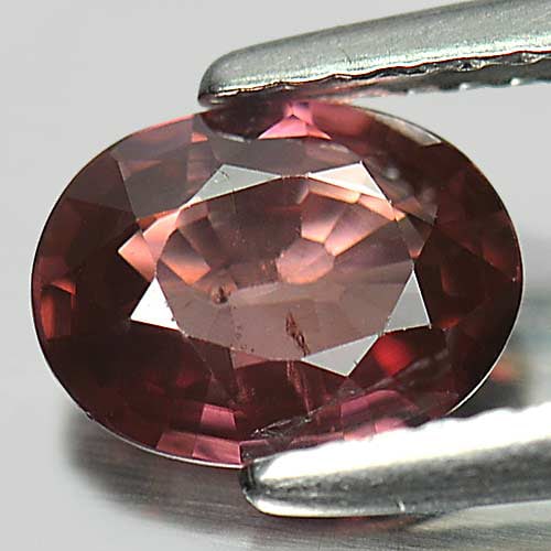 Natural Imperial Pink Zircon 1.40 Ct. Oval Shape 7.9 x 6 Mm. Gemstone From Tanzania: Product ID: 807724231 Product Name: Natural Zircon Weight: 1.40 CT. Size: 7.9 x 6 x 2.9 MM. Shape: Oval Color: Imperial Pink Clarity:SI1 Luster: Good Gems Origin: Tanzania Treatment: Unheated Crystal