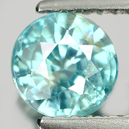Natural Blue Zircon 1.32 Ct. Round Shape 6.2 Mm. Gemstone From Cambodia: Product ID: 807717081 Product Name: Natural Zircon Weight: 1.32 CT. Size: 6.2 x 6.2 x 3.8 MM. Shape: Round Color: Blue Clarity:VSI Luster: Good Gems Origin: Cambodia Treatment: Heated Crystal Structur