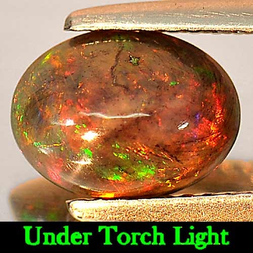 Natural Play Of Color Rainbow Fire Red Black Opal 0.84 Ct. Oval Cabochon Shape 9 x 6.9 Mm. Gemstone (1 of 3)