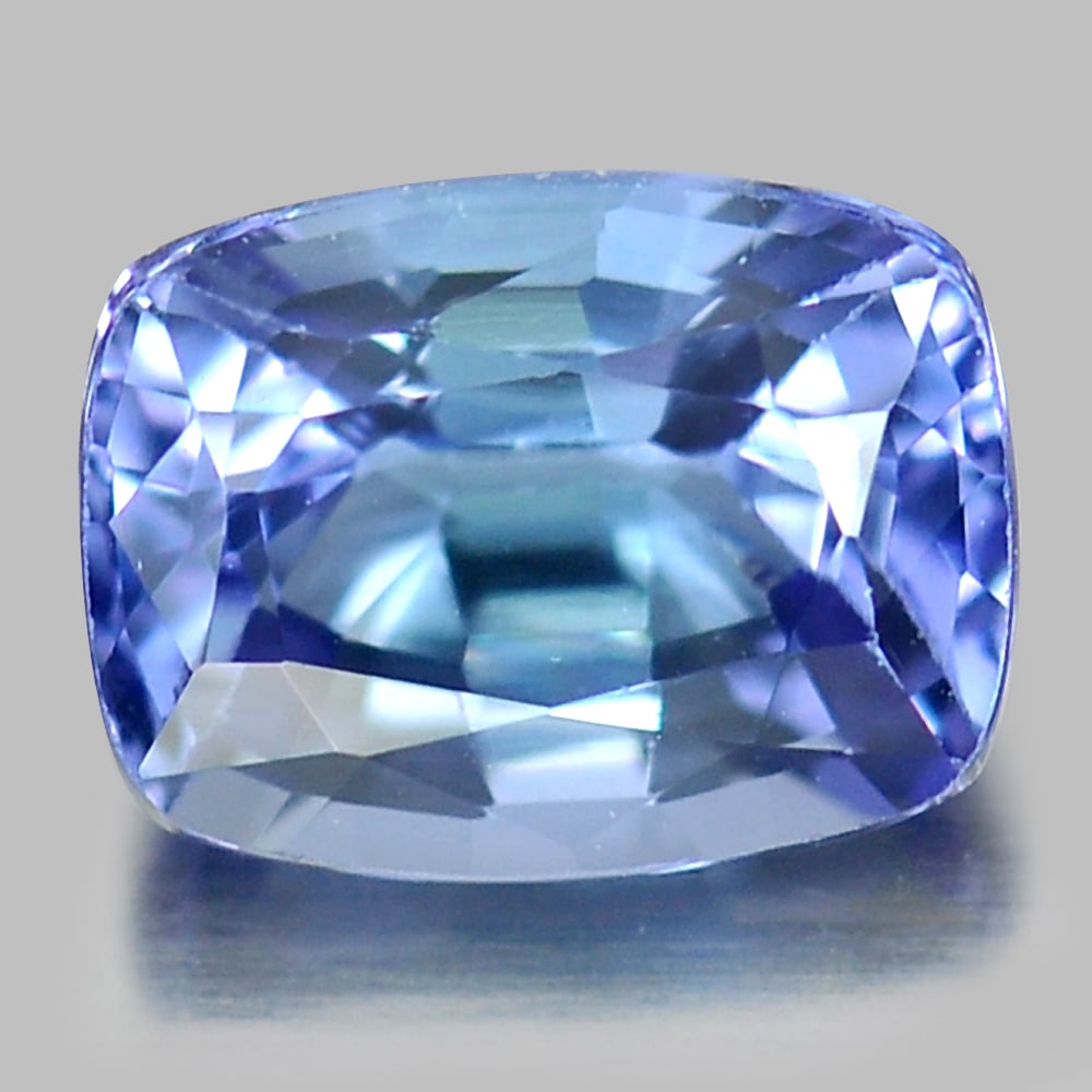 Natural Violet Blue Tanzanite 1.22 Ct. VVS Cushion Shape 7 x 5.2 Mm. Gemstone From Tanzania: Product ID: 807009131 Product Name: Natural Tanzanite Weight: 1.22 CT. Size: 7 x 5.2 x 4 MM. Shape: Cushion Color: Violet Blue Clarity:VVS Luster: Good Gems Origin: Tanzania Treatment: Heated Crystal 