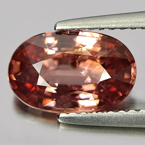 Natural Unheated Imperial Pink Zircon 3.15 Ct. Oval Shape 10.2 x 6.6 Mm. Gemstone From Tanzania: Product ID: 807720283 Product Name: Natural Zircon Weight: 3.15 CT. Size: 10.2 x 6.6 x 4.2 MM. Shape: Oval Color: Imperial Pink Clarity:SI1 Luster: Good Gems Origin: Tanzania Treatment: Unheated Cryst