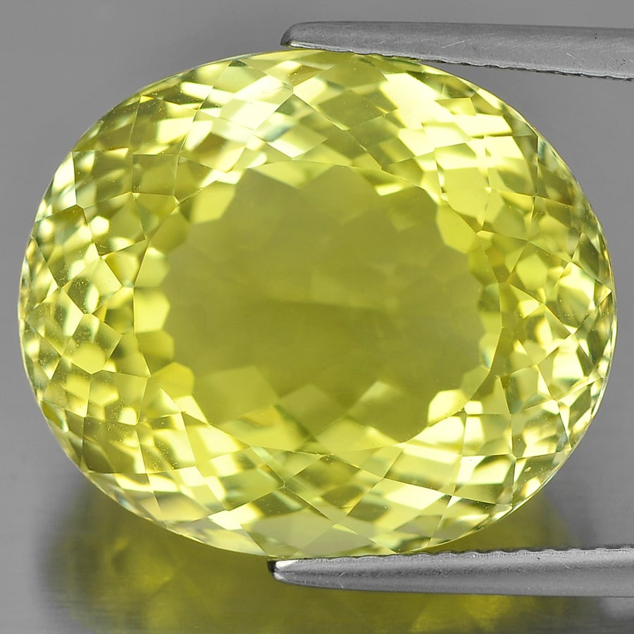 Natural Yellow Lemon Quartz 26.08 Ct. Clean Oval Shape 20 x 17 Mm. Gemstone From Brazil: Product ID: 805528958 Product Name: Natural Quartz Weight: 26.08 CT. Size: 20 x 17 x 12.6 MM. Shape: Oval Color: Yellow Clarity:IF Luster: Very Good Gems Origin: Brazil Treatment: Unheated Crystal Str