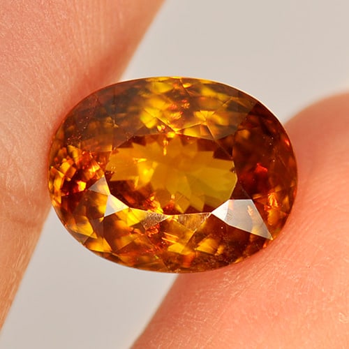 Natural Unheated Multi Color Sphene 6.17 Ct. Oval Shape 12.7 x 9.9 Mm. Gemstone From Madagascar: Product ID: 806507457 Product Name: Natural Sphene Weight: 6.17 CT. Size: 12.7 x 9.9 x 6.4 MM. Shape: Oval Color: Multi Color With Rainbow Spark Clarity:VSI Luster: Adamantine Gems Origin: Madagascar 