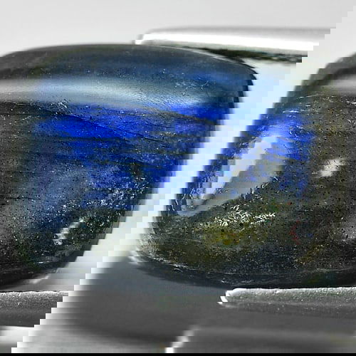 Natural Multi Color Blue Labradorite Doublet 8.24 Ct. Baguette Cabochon Shape 16 x 12 Mm. Unheated: Product ID: 804301213 Product Name: Natural Labradorite Weight: 8.24 CT. Size: 16 x 12 x 5 MM. Shape: Baguette Cabochon Color: Multi-Color Clarity:Opaque Luster: Iridescent Gems Origin: Canada Treatme