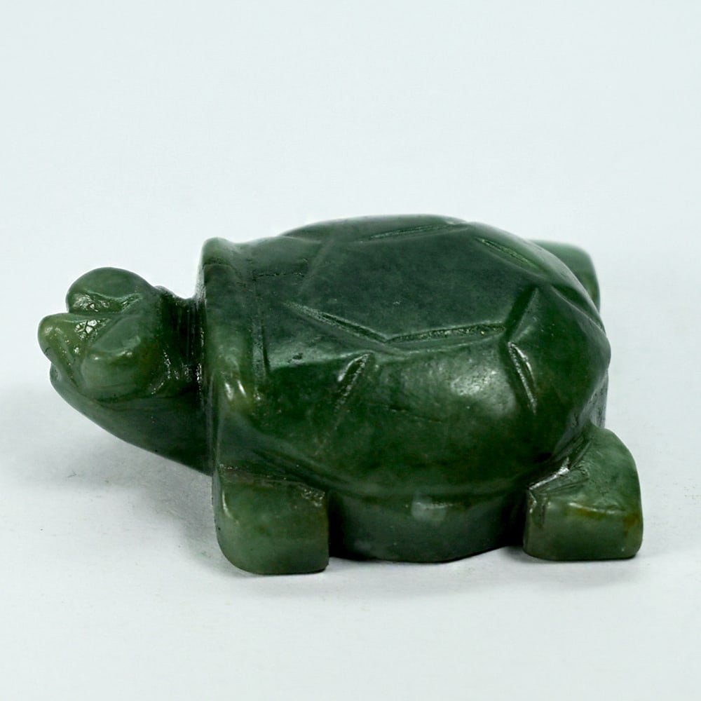 Natural Genuine Burmese Jade 249.19 Ct. Turtle Carving Size 35 x 49 x 16 Mm.: Product ID: 818102428 Product Name: Natural Gemstones Weight: 249.19 CT. Size: 35 x 49 x 16 MM. Shape: Caving Color: multi Color Green Clarity:Opaque Luster: Good Gems Origin: Burma Treatment: Unheate