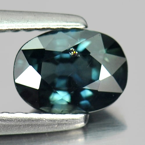 Natural Bluish Green Sapphire 1.09 Ct. Oval Shape 7 x 5.3 Mm. Gemstone From Thailand: Product ID: 806144752 Product Name: Natural Green Sapphire Weight: 1.09 CT. Size: 7 x 5.3 x 3.4 MM. Shape: Oval Color: Bluish Green Clarity:SI Luster: Good Gems Origin: Thailand Treatment: Heated Crys