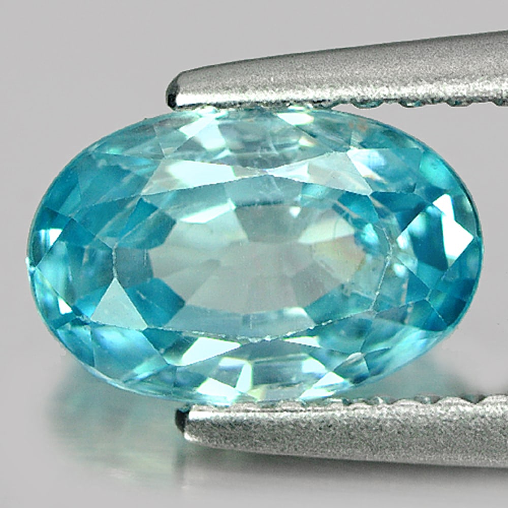 Blue Color Zircon 1.74 Ct. Oval Shape 8.5 x 5.6 Mm. Natural Gemstone From Cambodia: Product ID: 807714965 Product Name: Natural Zircon Weight: 1.74 CT. Size: 8.5 x 5.6 x 3.5 MM. Shape: Oval Color: Blue Clarity:SI1 Luster: Good Gems Origin: Cambodia Treatment: Heated Crystal Structure