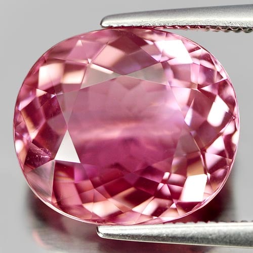 Natural Pink Tourmaline 6.51 Ct. Clean Oval Shape 12.8 x 11.2 Mm. Gemstone From Nigeria: Product ID: 807241063 Product Name: Natural Tourmaline Weight: 6.51 CT. Size: 12.8 x 11.2 x 6.3 MM. Shape: Oval Color: Pink Clarity:IF Luster: Very Good Gems Origin: Nigeria Treatment: Unheated Crysta