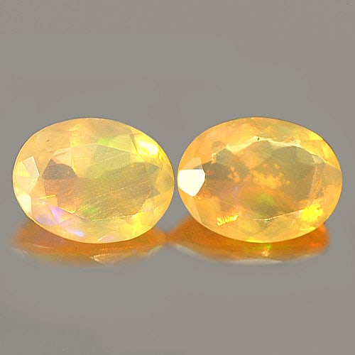 Natural Unheated Multi Color Opal 1.42 Ct. 2 Pcs. Oval Shape 8.1 x 6.1 Mm. Gemstone: Product ID: 818726123 Product Name: Natural Opal Weight: 1.42 CT. Size: 8.1 x 6.1 x 3.5 MM. Shape: Oval Color: Multi-Color Clarity:Semi - Transparent Luster: Iridescent Gems Origin: Ethiopia Treatment