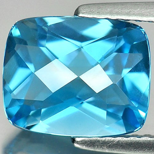 Natural Swiss Blue Topaz 3.60 Ct. Clean Cushion Checkerboard 10 x 8 Mm. Gemstone From Brazil: Product ID: 807166069 Product Name: Natural Blue Topaz Weight: 3.60 CT. Size: 10 x 8 x 5.5 MM. Shape: Cushion Checkerboard Color: Blue Clarity:IF Luster: Good Gems Origin: Brazil Treatment: Treated Cr