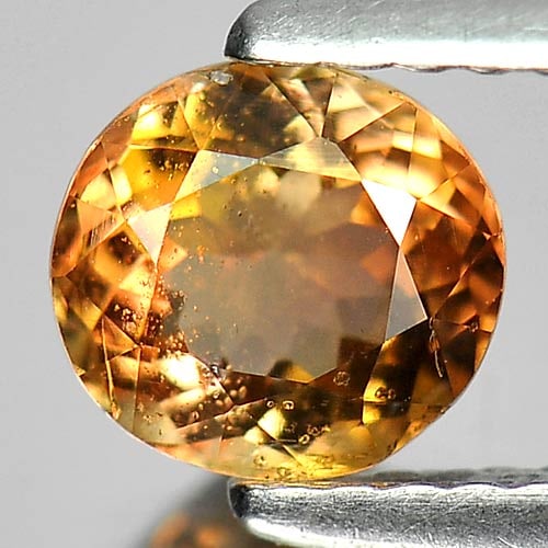 Natural Multi Color Tourmaline 0.80 Ct. Oval Shape 6 x 5.6 Mm. Unheated Gemstone from Nigeria: Product ID: 807249225 Product Name: Natural Tourmaline Weight: 0.80 CT. Size: 6 x 5.6 x 3.7 MM. Shape: Oval Color: Multi Color Clarity:VSI Luster: Good Gems Origin: Nigeria Treatment: Unheated Crystal