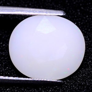 Natural Multi Color Opal 4.16 Ct. Oval Shape 12.7 x 11 Mm. Gemstone from Ethiopia: Product ID: 818709855 Product Name: Natural Opal Weight: 4.16 CT. Size: 12.7 x 11 x 7.2 MM. Shape: Oval Color: Multi Color Clarity:Semi - Transparent Luster: Good Gems Origin: Ethiopia Treatment: Unhe