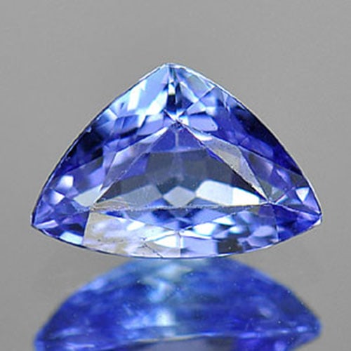 Natural Violetish Blue Tanzanite 0.60 Ct VVS Trilliant Shape 7 x 4.6 Mm Gemstone from Tanzania: Product ID: 807006684 Product Name: Natural Tanzanite Weight: 0.60 CT. Size: 7 x 4.6 x 3 MM. Shape: Trilliant Color: Violetish Blue Clarity:VVS Luster: Good Gems Origin: Tanzania Treatment: Heated Cry