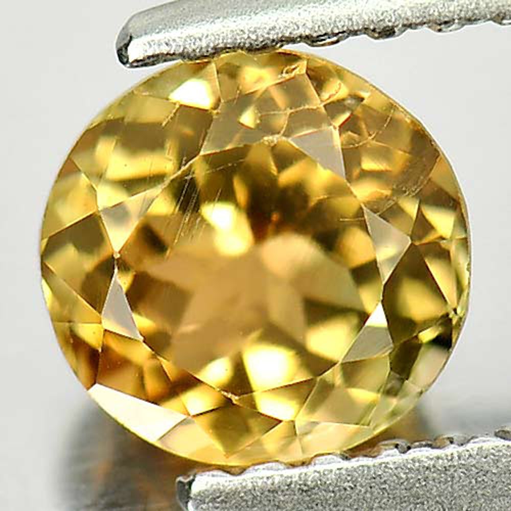Natural Yellow Tourmaline 0.93 Ct. Round Shape 5.8 Mm. Gemstone From Nigeria: Product ID: 807246313 Product Name: Natural Tourmaline Weight: 0.93 CT. Size: 5.8 x 5.8 x 4.1 MM. Shape: Round Color: Bi Color Clarity:VSI Luster: Very Good Gems Origin: Nigeria Treatment: Unheated Cr