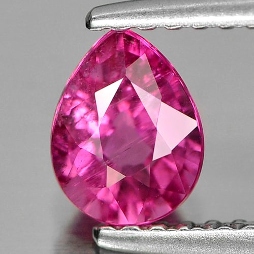 Natural Purplish Pink Rubellite 0.67 Ct. Pear Shape 6.4 x 5 Mm. Gemstone From Nigeria: Product ID: 805800327 Product Name: Natural Rubellite Weight: 0.67 CT. Size: 6.4 x 5 x 3.6 MM. Shape: Pear Color: Purplish Pink Clarity:SI Luster: Good Gems Origin: Nigeria Treatment: Unheated Crystal