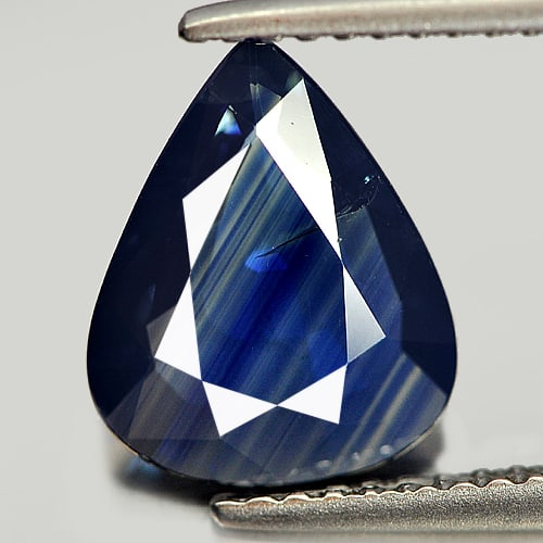 Certified Natural Blue Sapphire 2.05 Ct. Pear Shape 10.57 x 8.54 Mm Gemstone From Thailand: Product ID: 806006191 Product Name: Natural Blue Sapphire Weight: 2.05 CT. Size: 10.57 x 8.54 x 2.66 MM. Shape: Pear Color: Blue Clarity:SI Luster: Good Gems Origin: Thailand Treatment: Heated Crystal