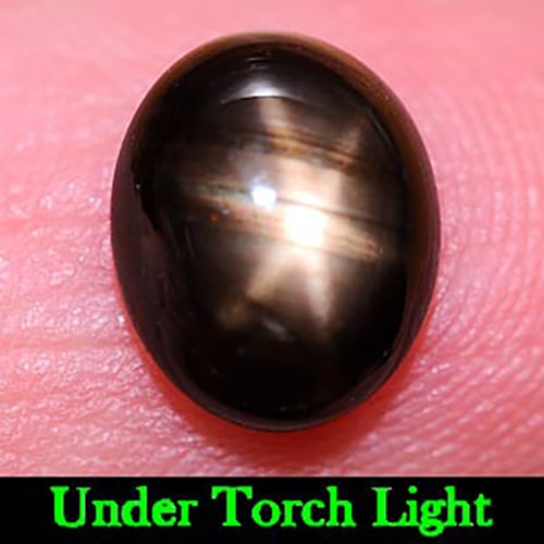 Natural Black Star Sapphire 6 Rays 2.41 Ct. Oval Cabochon Shape 8.7 x 7.1 Mm. Gemstone From Thailand: Product ID: 806137565 Product Name: Natural Star Sapphire Weight: 2.41 CT. Size: 8.7 x 7.1 x 3.5 MM. Shape: Oval Cabochon Color: Black Clarity:Opaque Luster: Good 6 Rays Star Gems Origin: Thailand Tre