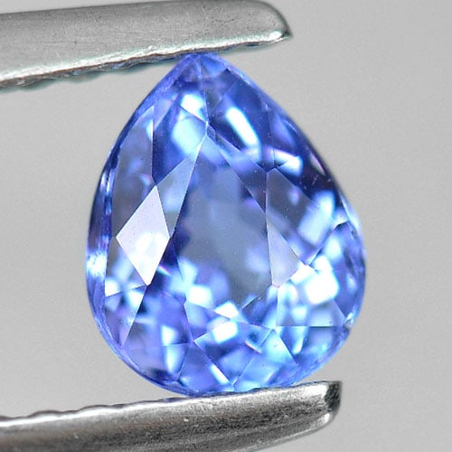 Natural Violetish Blue Tanzanite 0.67 Ct. Pear Shape 6 x 4.8 Mm. Gemstone From Tanzania: Product ID: 807007715 Product Name: Natural Tanzanite Weight: 0.67 CT. Size: 6 x 4.8 x 3.6 MM. Shape: Pear Color: Violetish Blue Clarity:VSI Luster: Good Gems Origin: Tanzania Treatment: Heated Crysta