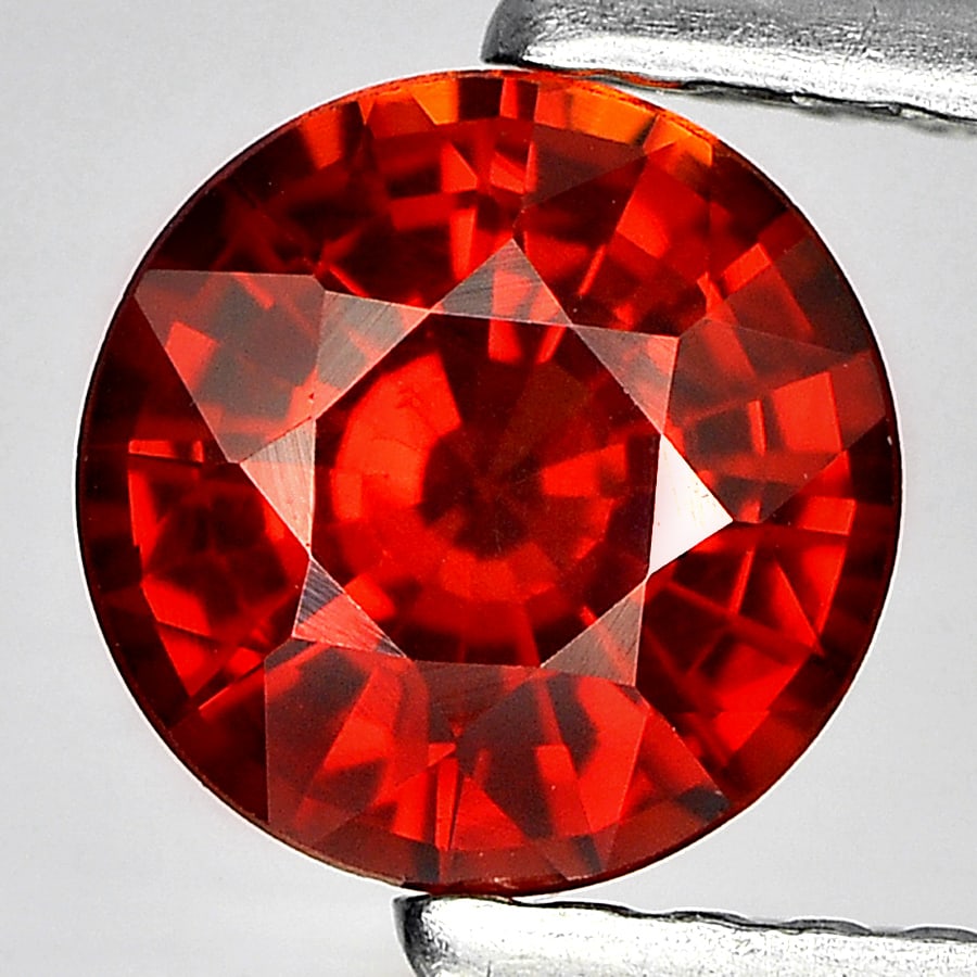 Natural Reddish Orange Spessartine Garnet 1.08 Ct. Round Shape 6 Mm. Gemstone From Nigeria: Product ID: 802936228 Product Name: Natural Spessartine Weight: 1.08 CT. Size: 6 x 3.8 MM. Shape: Round Color: Orange Clarity:VSI Luster: Good Gems Origin: Nigeria Treatment: Unheated Crystal Structur
