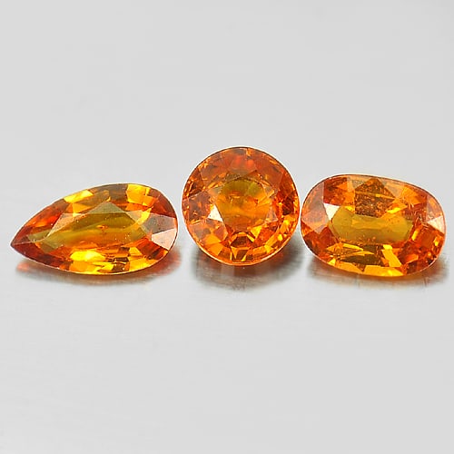 Natural Orange Spessartine Garnet 2.12 Ct 3 Pcs. Mix Shape Mix Size Gemstone From Nigeria: Product ID: 802926107 Product Name: Natural Spessartine Weight: 2.12 CT. Size: 6.4 x 4.4 x 2.8 MM. Shape: Mix Shape Color: Orange Clarity:VSI Luster: Good Gems Origin: Nigeria Treatment: Unheated Crys